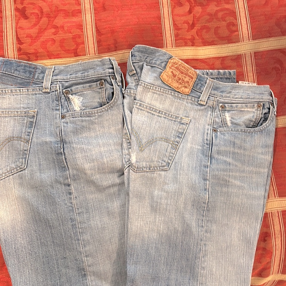 Two pairs men’s slightly distressed 501 you guys, button  up fly